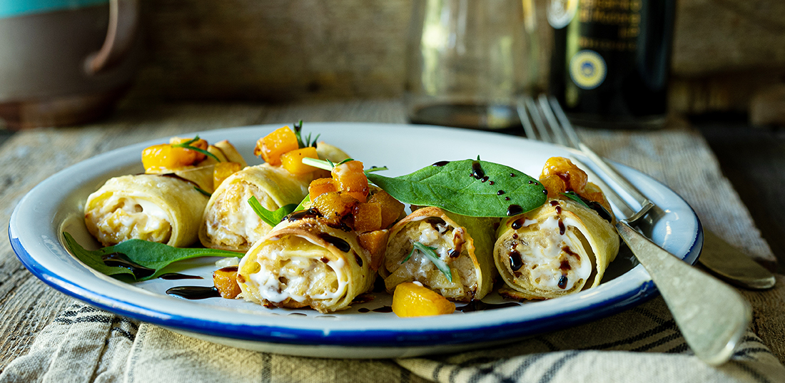 Cannelloni gefüllt mit Ricotta, Spinat, Champignons und Kürbiswürfel