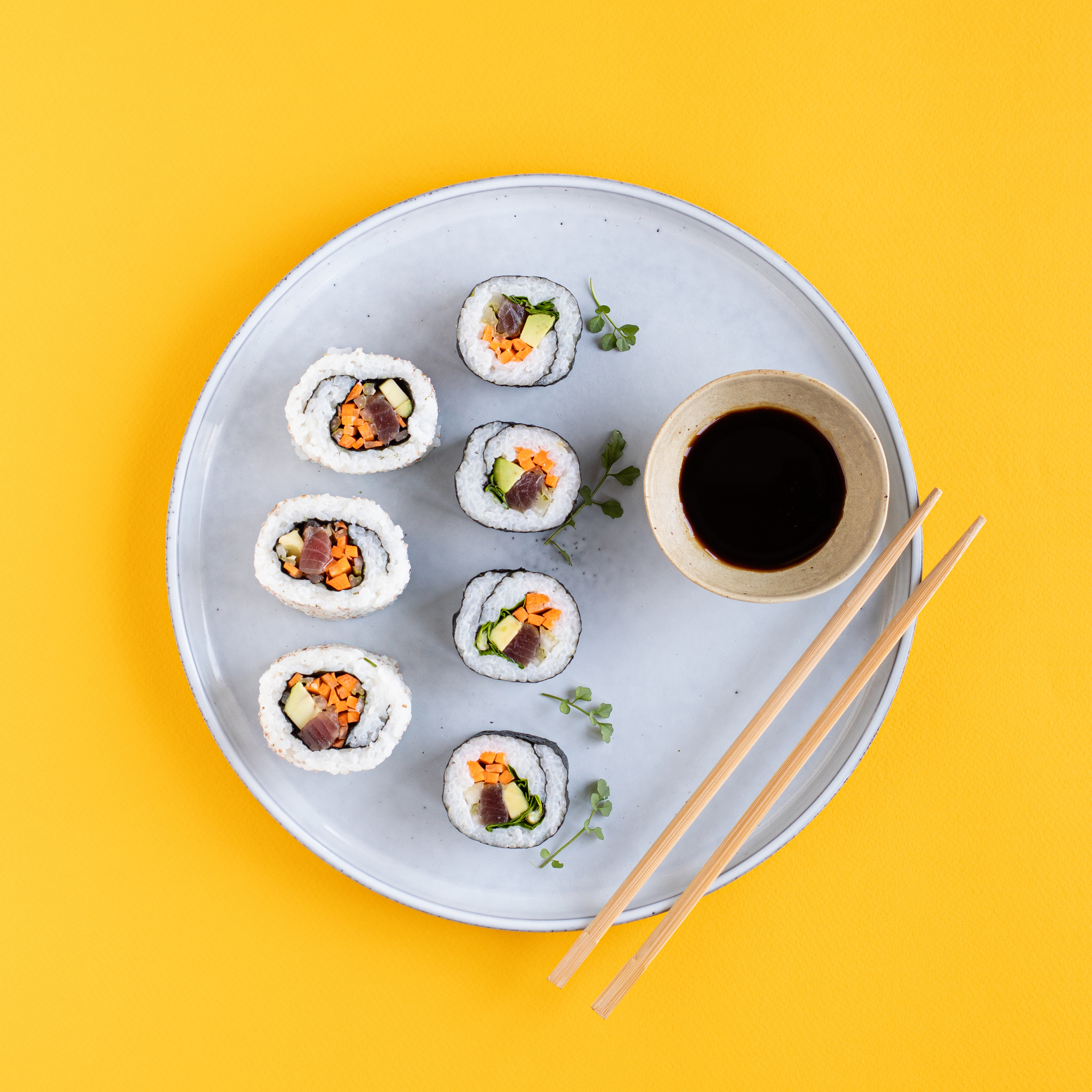 Rice sushi rolls with Balsamic Vinegar of Modena PGI, tuna and vegetables