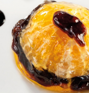 Orange aspic with a heart of Port and foam made with Aceto Balsamico di Modena PGI