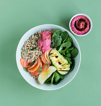 Bowl of spelt, marinated salmon, beetroot hummus and Balsamic Vinegar of Modena PGI