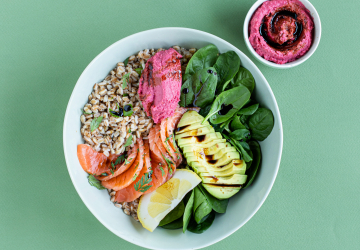 Bowl of spelt, marinated salmon, beetroot hummus and Balsamic Vinegar of Modena PGI