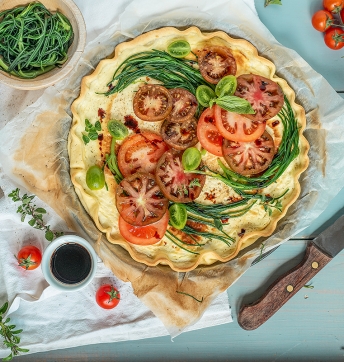 Robiola cheese tart with agretti and tomato
