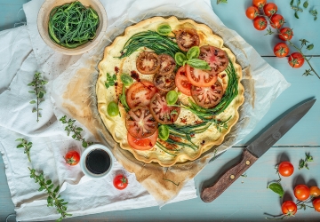 Robiola cheese tart with agretti and tomato