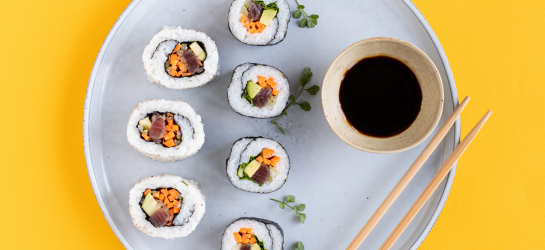 Rice sushi rolls with Balsamic Vinegar of Modena PGI, tuna and vegetables