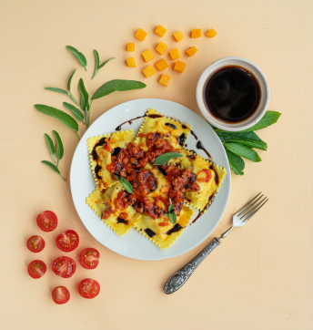 Tortelli di zucca con ragù di salsiccia all’Aceto Balsamico di Modena IGP